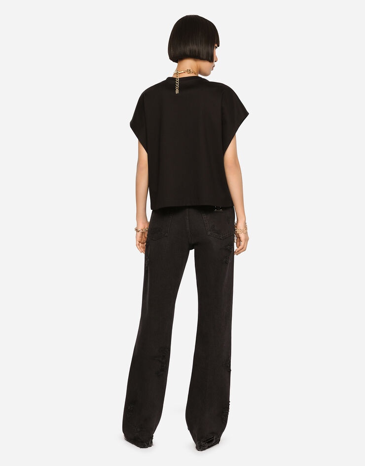 Flared jeans with ripped details - 3