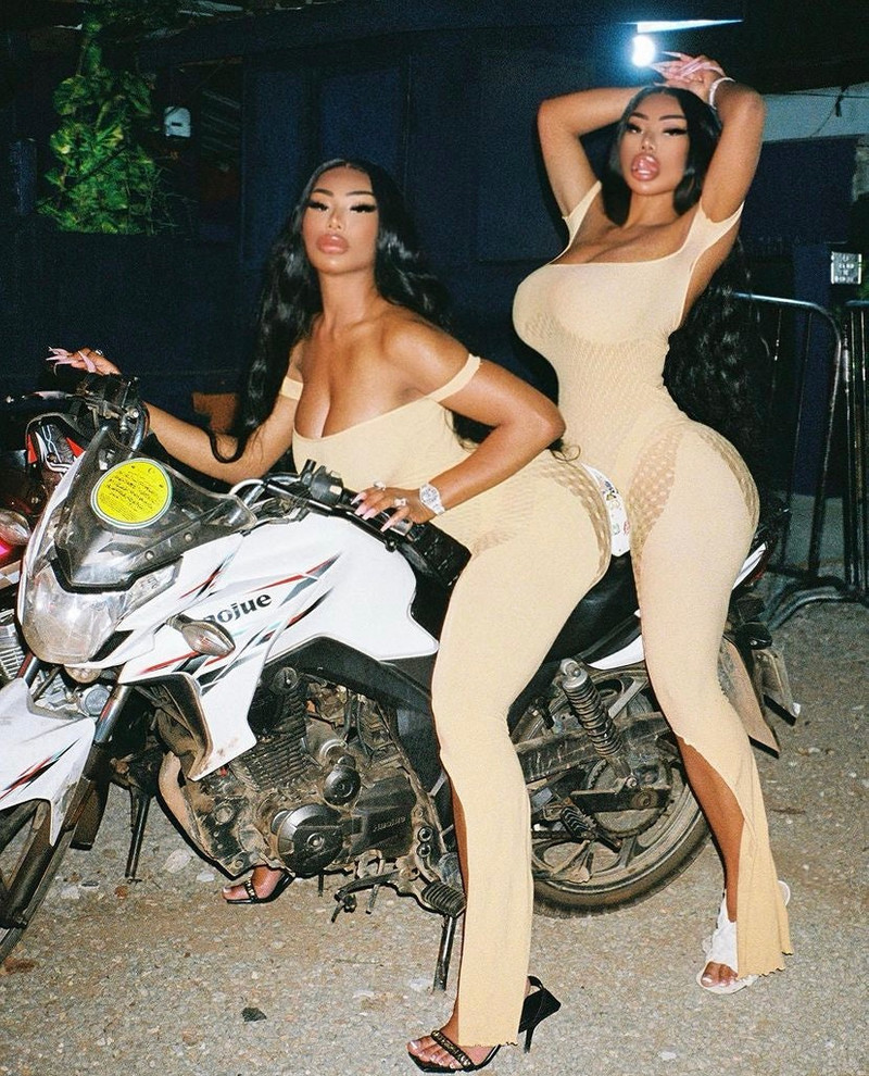 JUNIA JUMPSUIT IN BURNT HENNA CHOCOLATE MARABOU FEATHERS 3