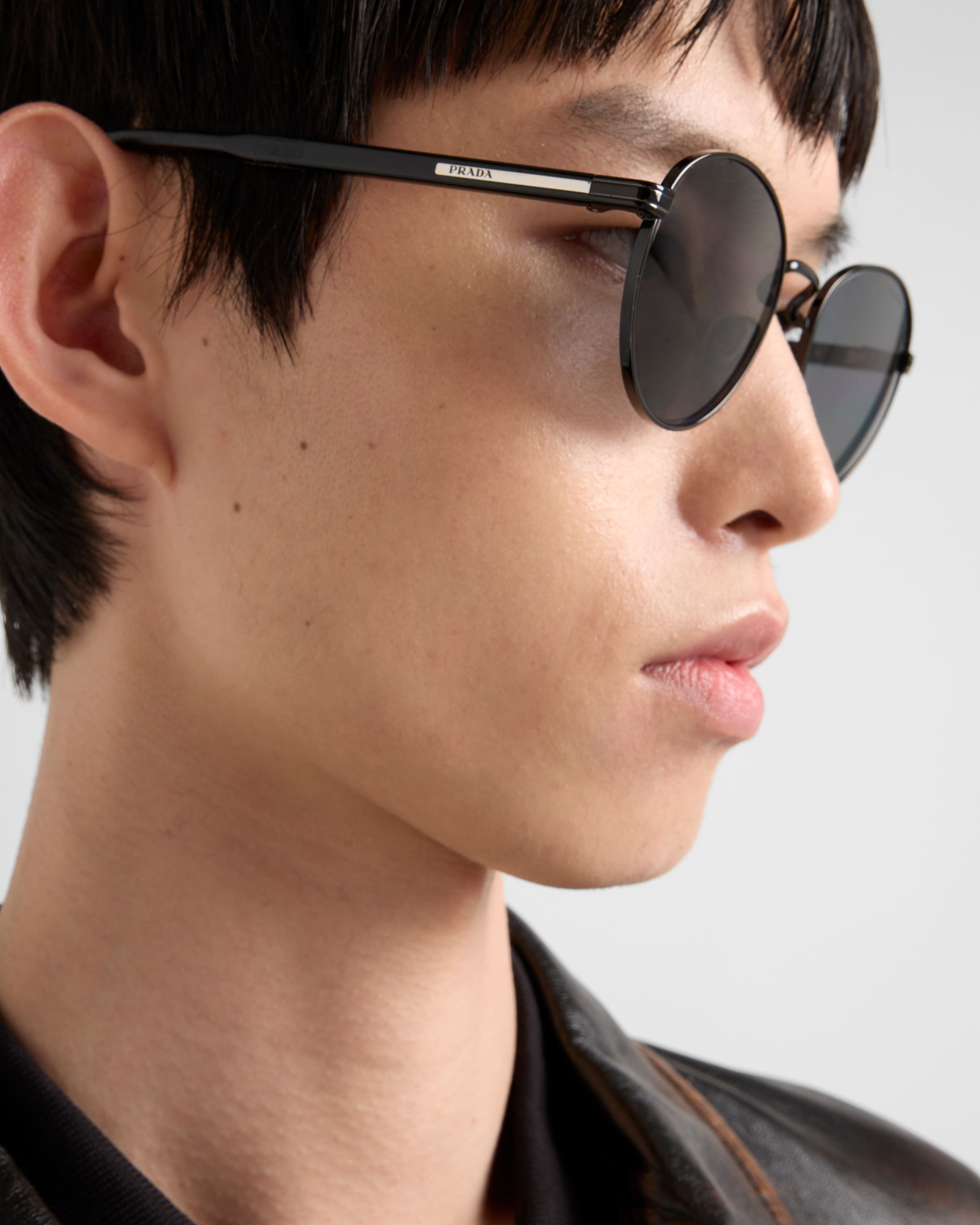 Prada Sunglasses with the iconic metal plaque | REVERSIBLE