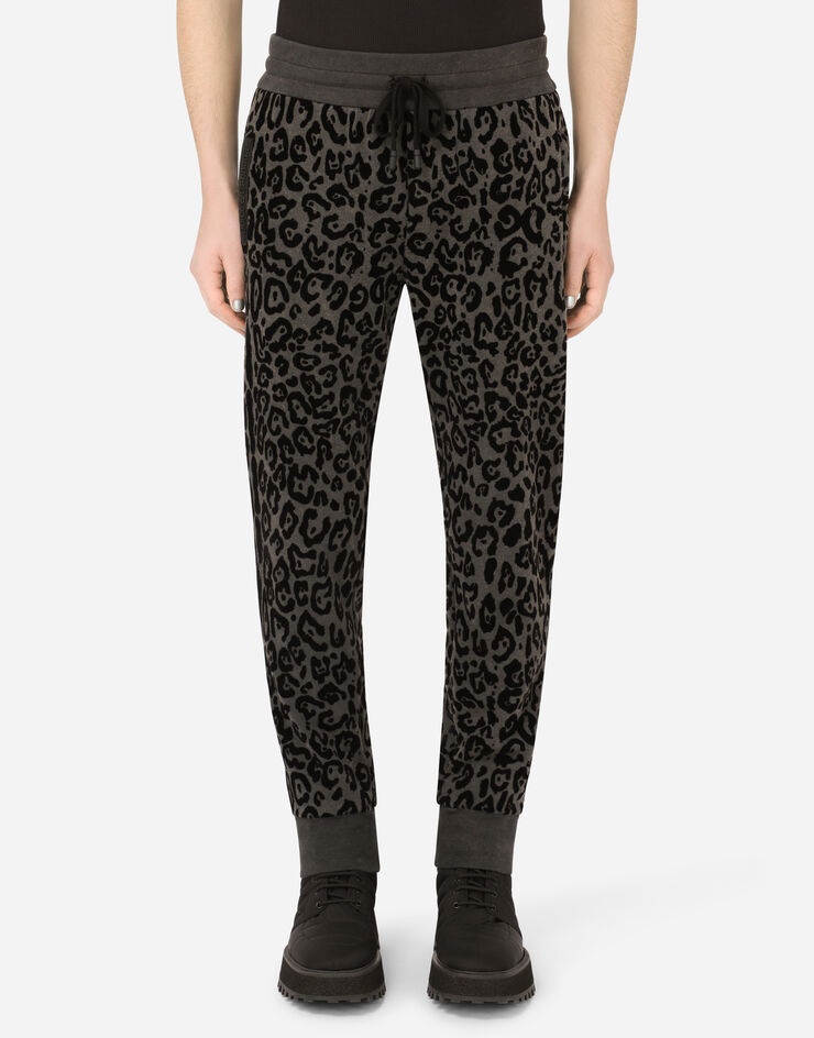 Jogging pants with flocked leopard print - 1