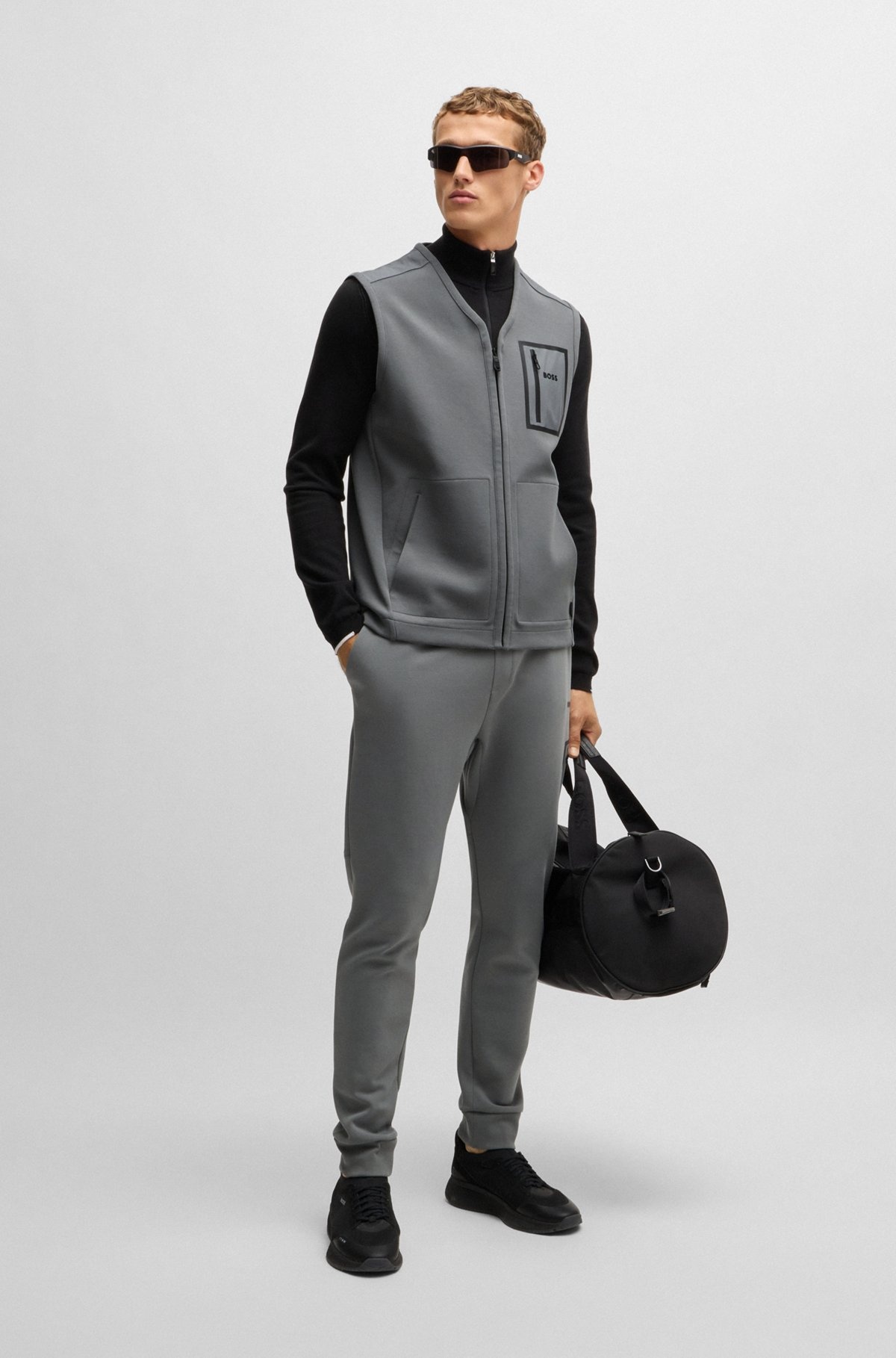 GILET WITH DECORATIVE REFLECTIVE LOGO - 4
