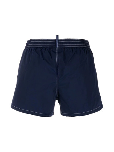 DSQUARED2 logo-print swim shorts outlook