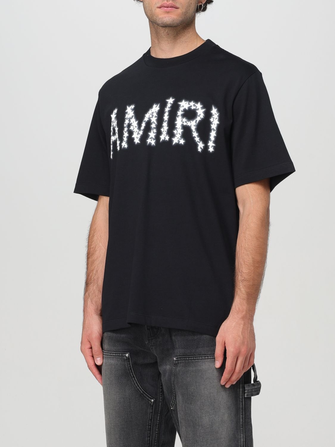 Tシャツ・カットソー AMIRI Men T Shirts AMIRI graphic-print t-shirt | Black | FARFETCH