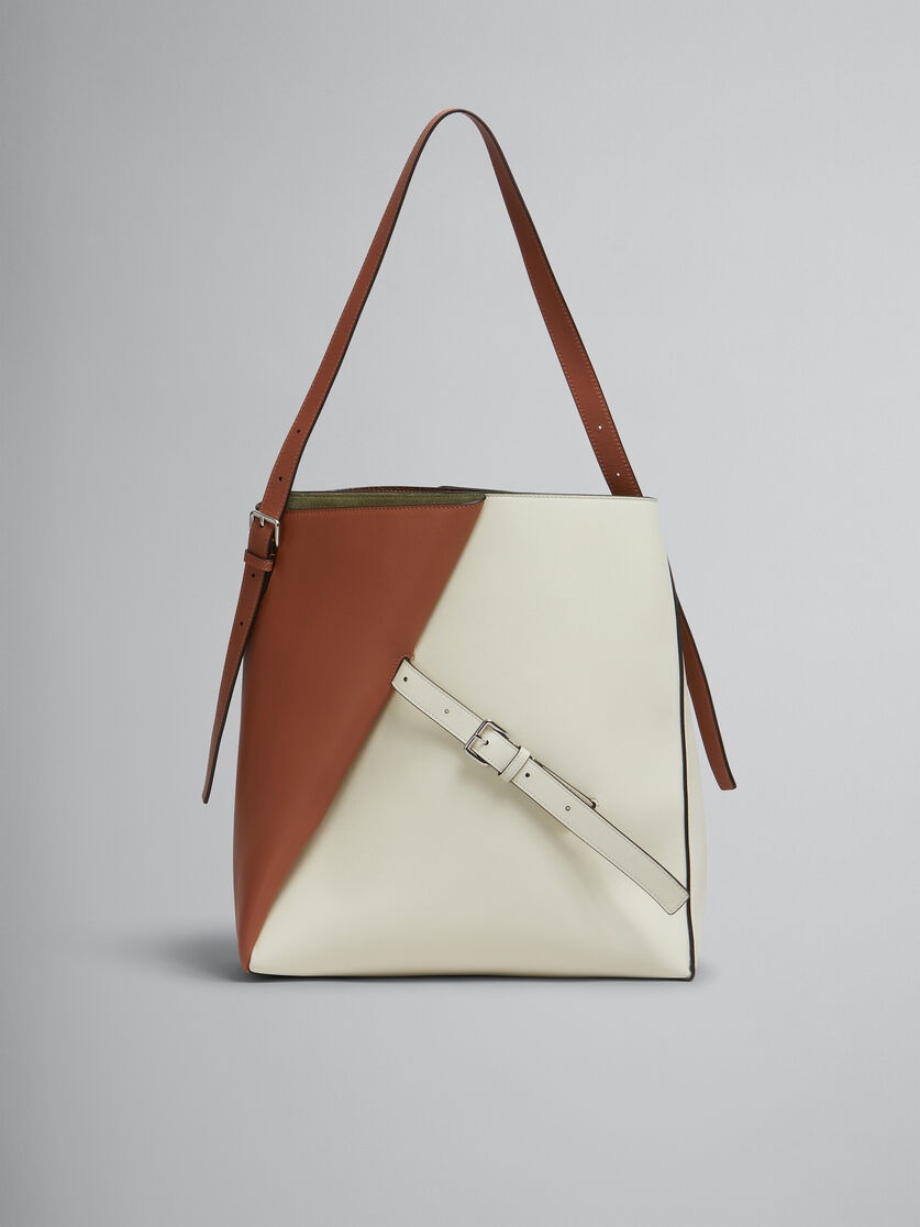 BROWN AND WHITE LEATHER REVERSE HOBO BAG - 1