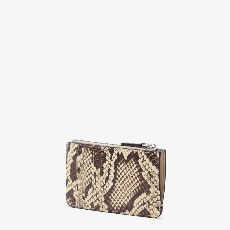 Fendi Roma key pouch with gusseted sides. The back features four card slots. Inside there is a pull- 2