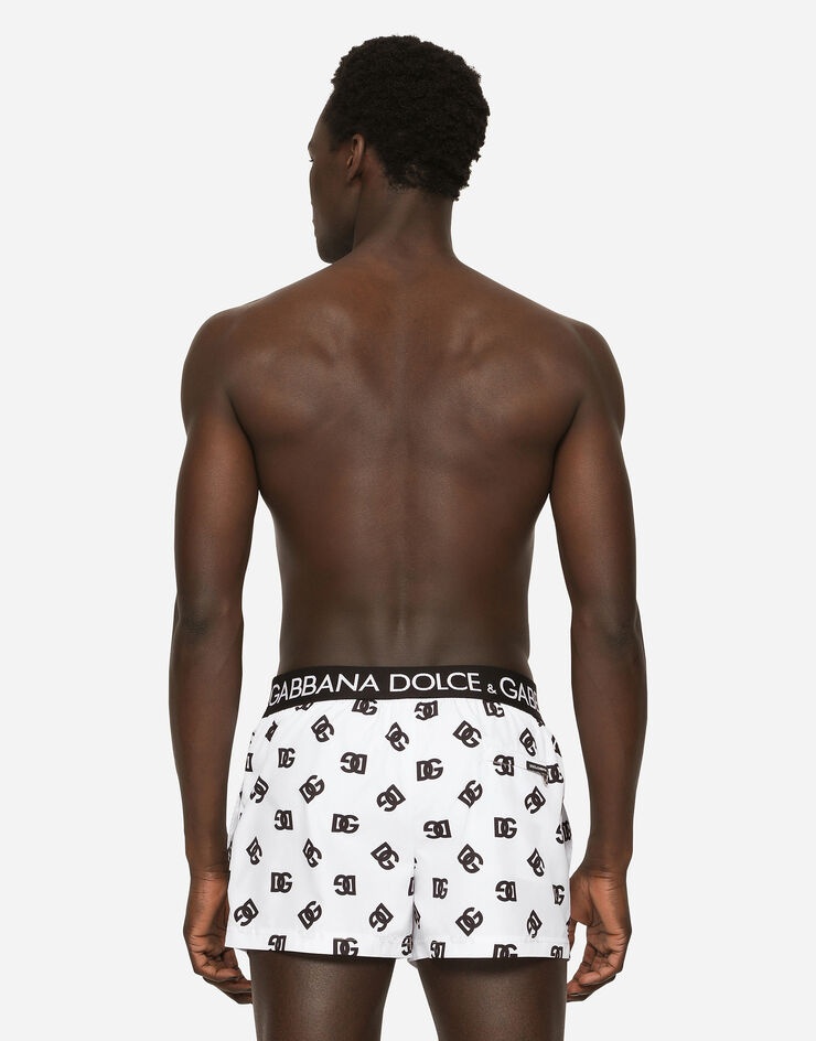Short swim trunks with all-over DG print - 5