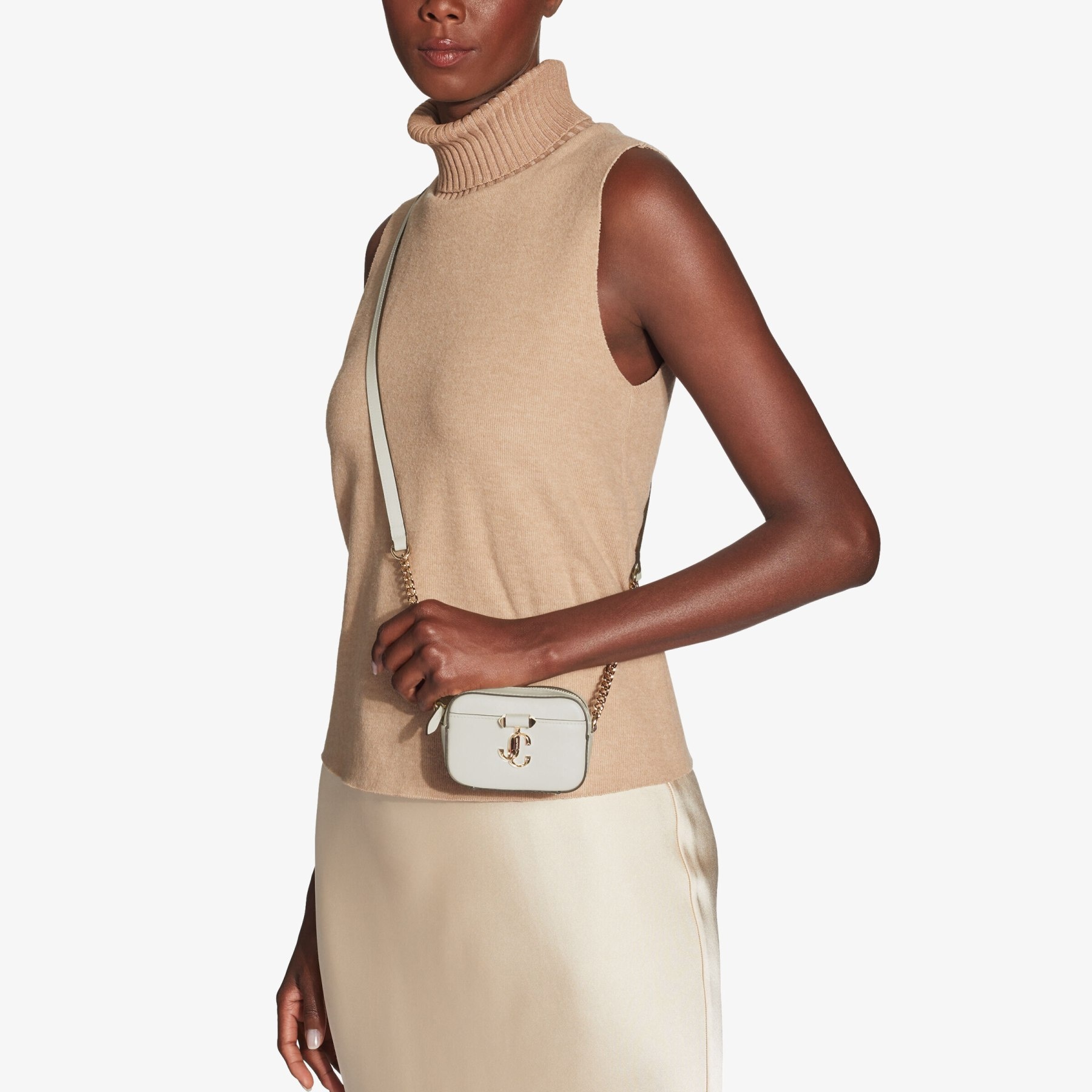 Micro Hale
Latte Soft Shiny Calf Leather Mini Bag with Light Gold JC Emblem - 2