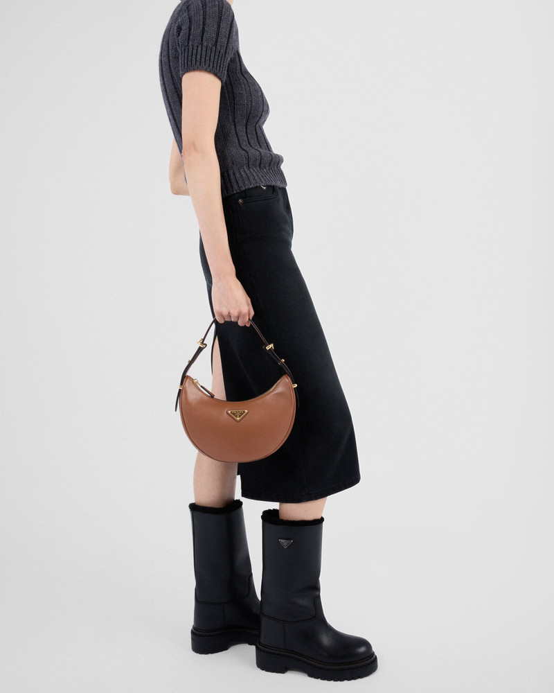 Prada Leather and shearling boots outlook