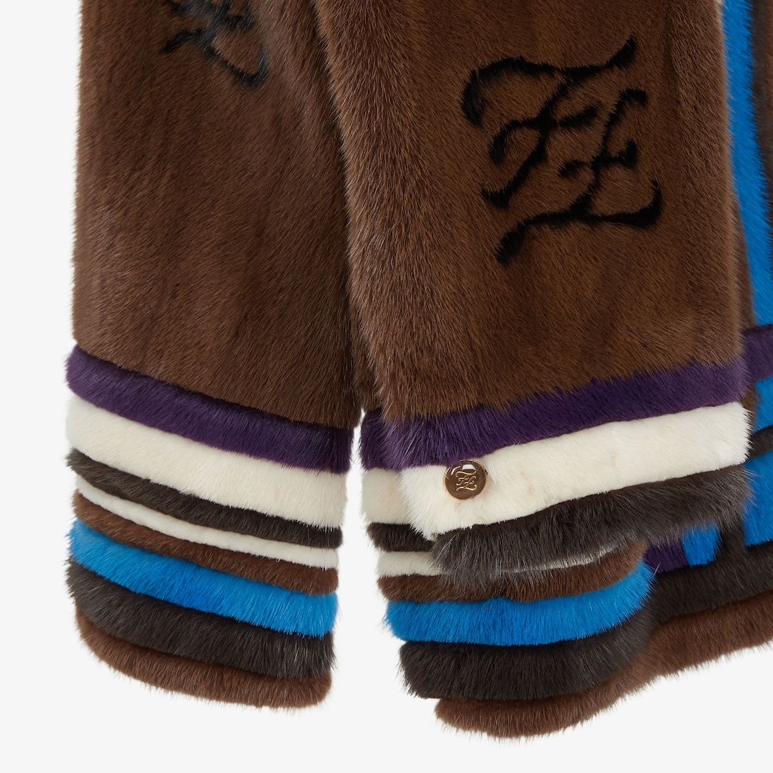 Pea coat with shirt collar, side slits and concealed button closure. Made of brown mink. Inlaid with - 4