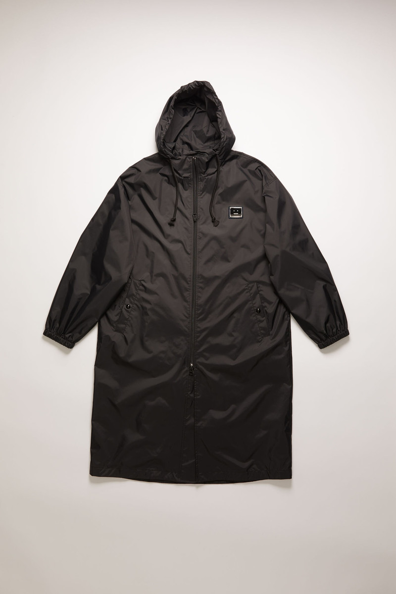 Face plaque technical raincoat black 1
