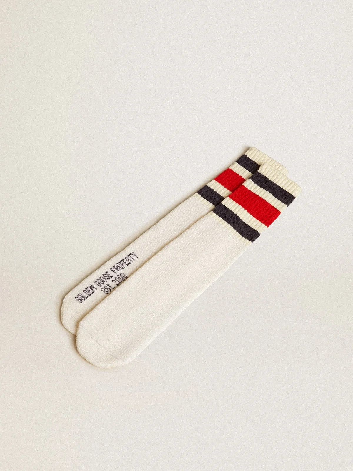 Worn-white socks with distressed details and black and red stripes - 1