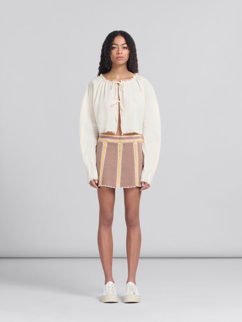 BROWN ORGANIC DENIM MINI SKIRT WITH CROCHET DETAILS - 1
