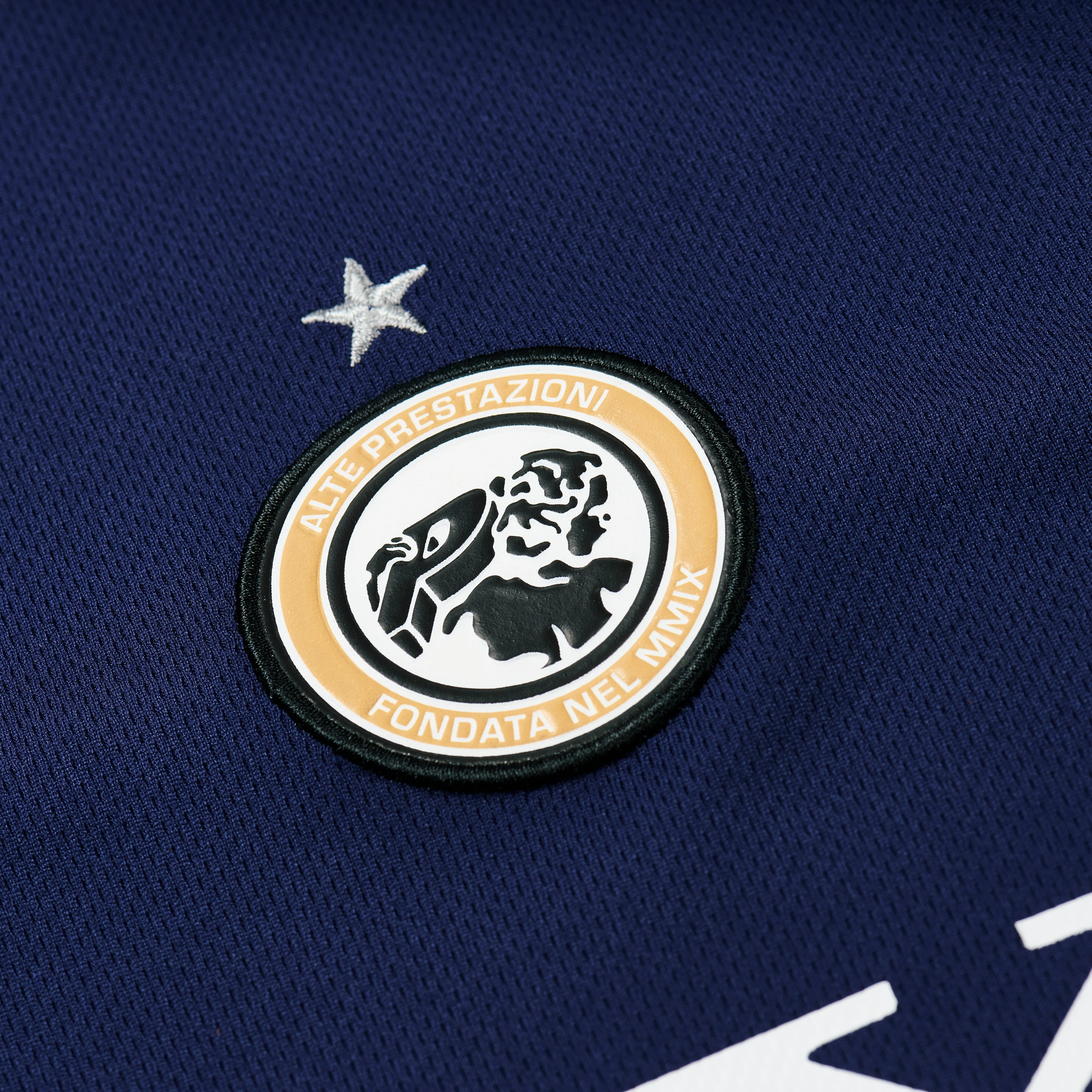 PALACE PRO TEAM PIPED JERSEY NAVY | REVERSIBLE