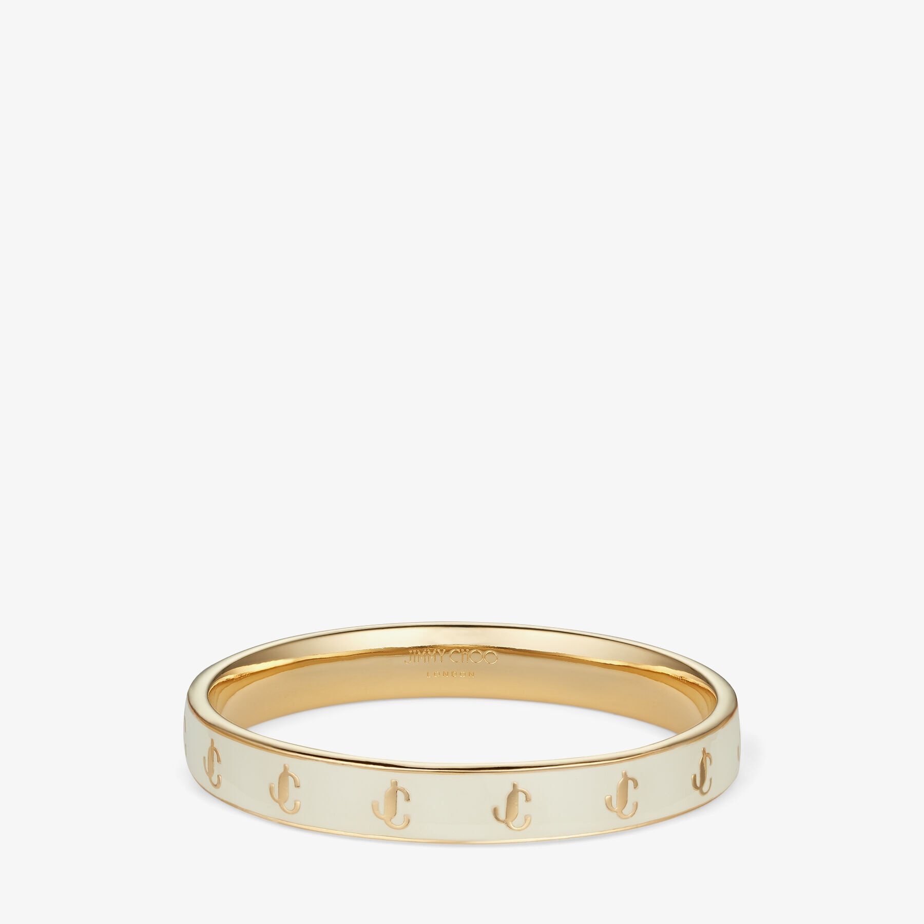JC Enamel Bangle
Gold-Finish Metal and Latte Enamel JC Bangle - 1