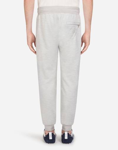 Dolce & Gabbana Cotton and silk jogging pants with embroidery outlook