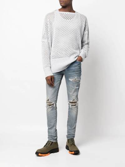 AMIRI tartan-patch ripped skinny jeans outlook