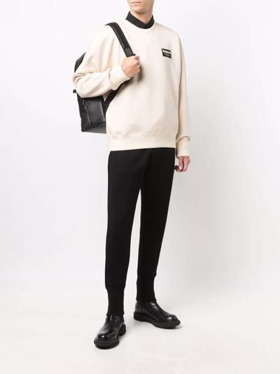 Alexander McQueen tapered logo-patch track pants outlook