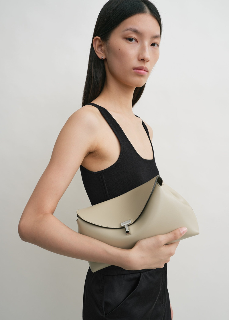 Totême T-Lock clutch fawn outlook
