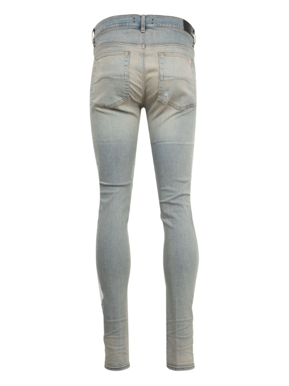 Bones-appliqué distressed skinny jeans - 4