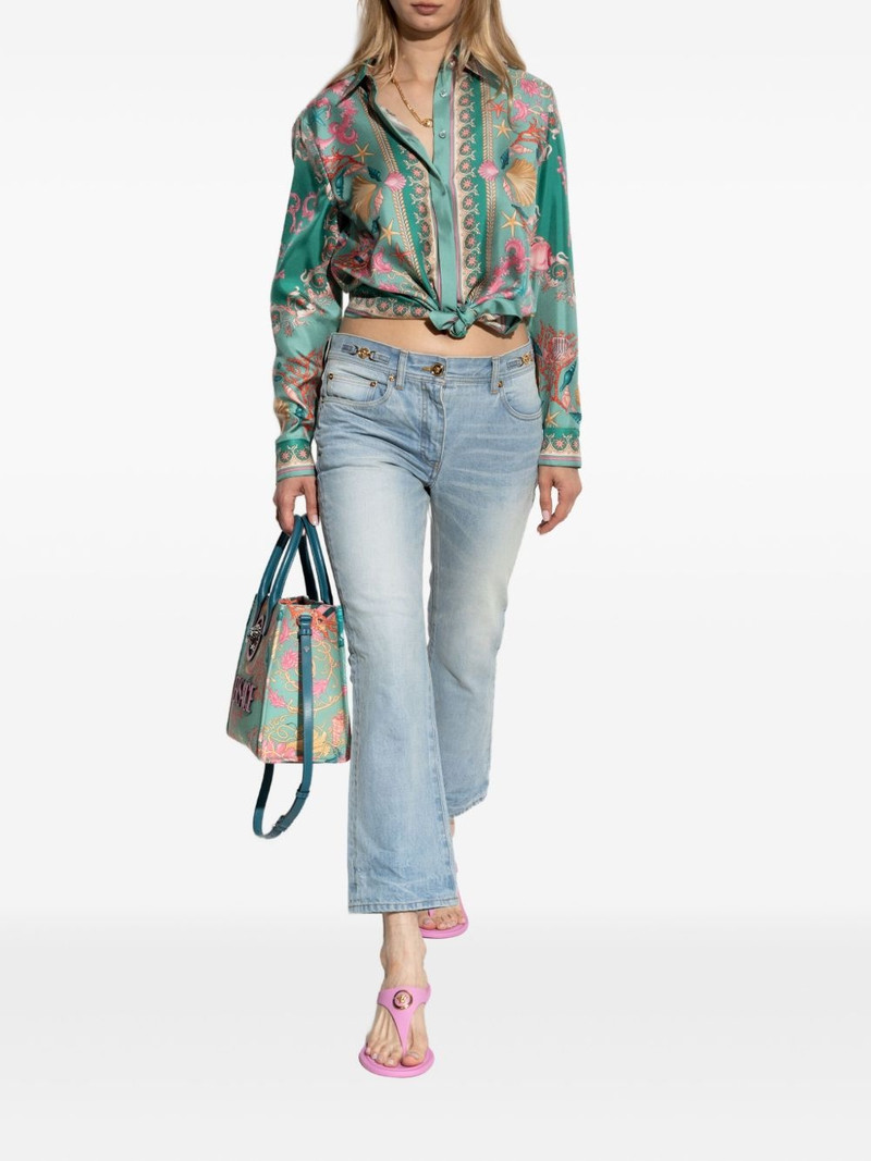 VERSACE logo-patch jeans outlook