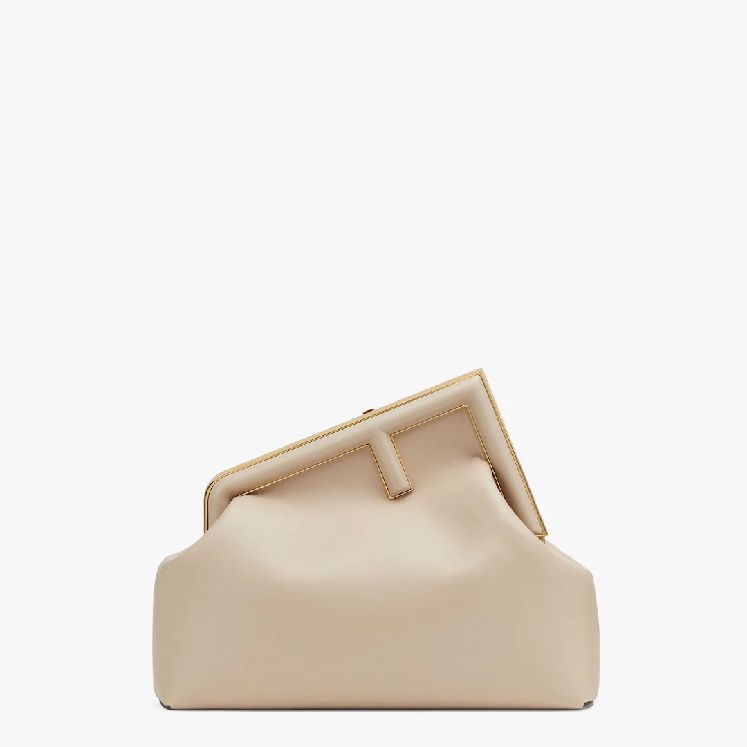Medium Fendi First bag made of soft, beige nappa leather with oversized metal F clasp bound in tone  - 1