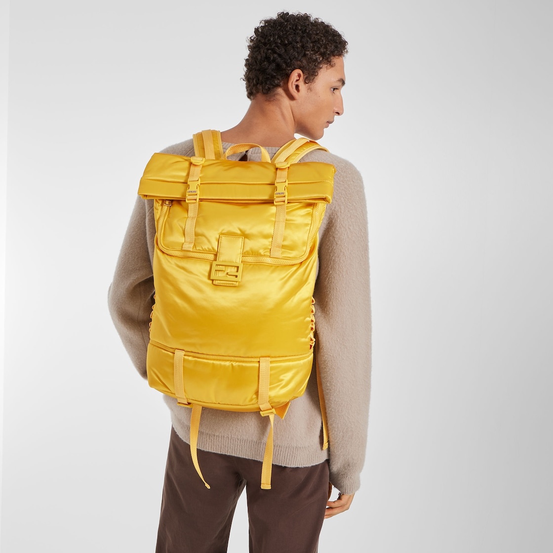 Rolltop backpack in yellow nylon, decorated with enameled tone on tone Baguette buckle. Button and h - 7