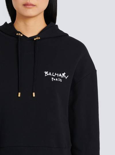 Balmain Cropped eco-design cotton sweatshirt with flocked graffiti Balmain logo outlook