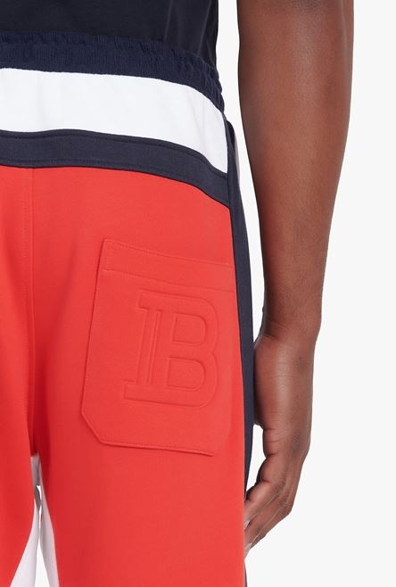Red, navy blue and white eco-designed cotton sweatpants with embossed Balmain logo - 8