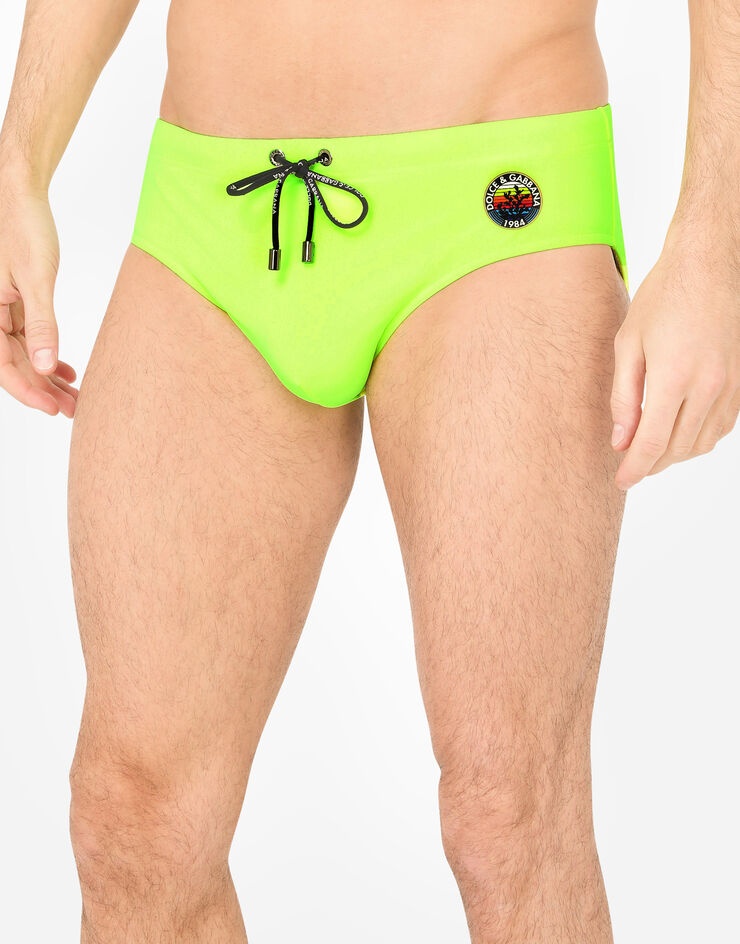 Swim briefs with high-cut leg and Dolce&Gabbana print - 4