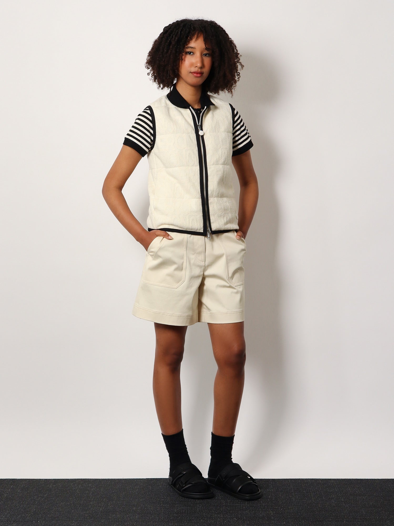 ベスト・ジレ MONCLER Padded cotton blend vest with all-over logo MONCLER Padded cotton blend vest with all-over logo (MONCLER