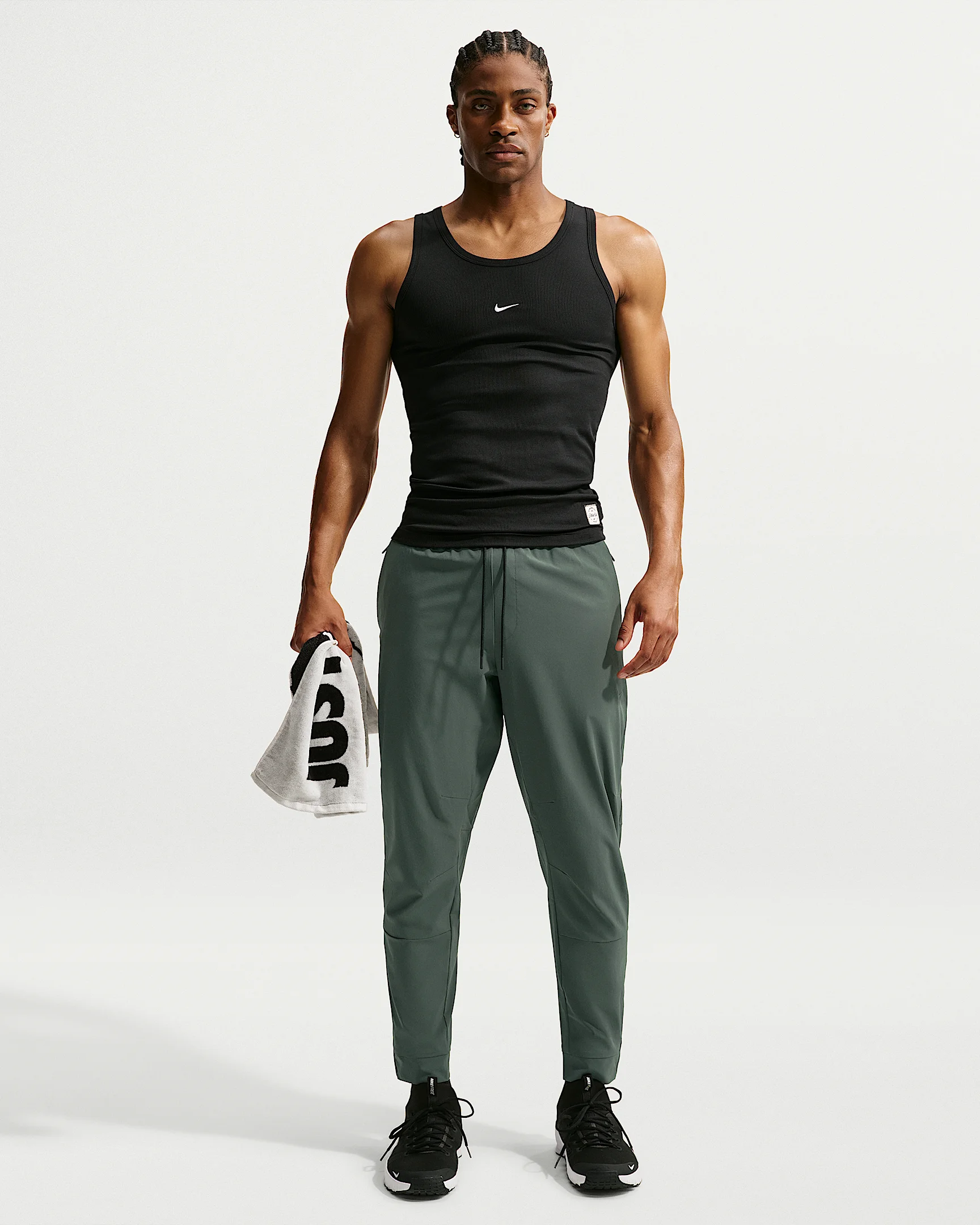 Nike Unlimited Men's Dri-FIT Zippered Cuff Versatile Pants - 1