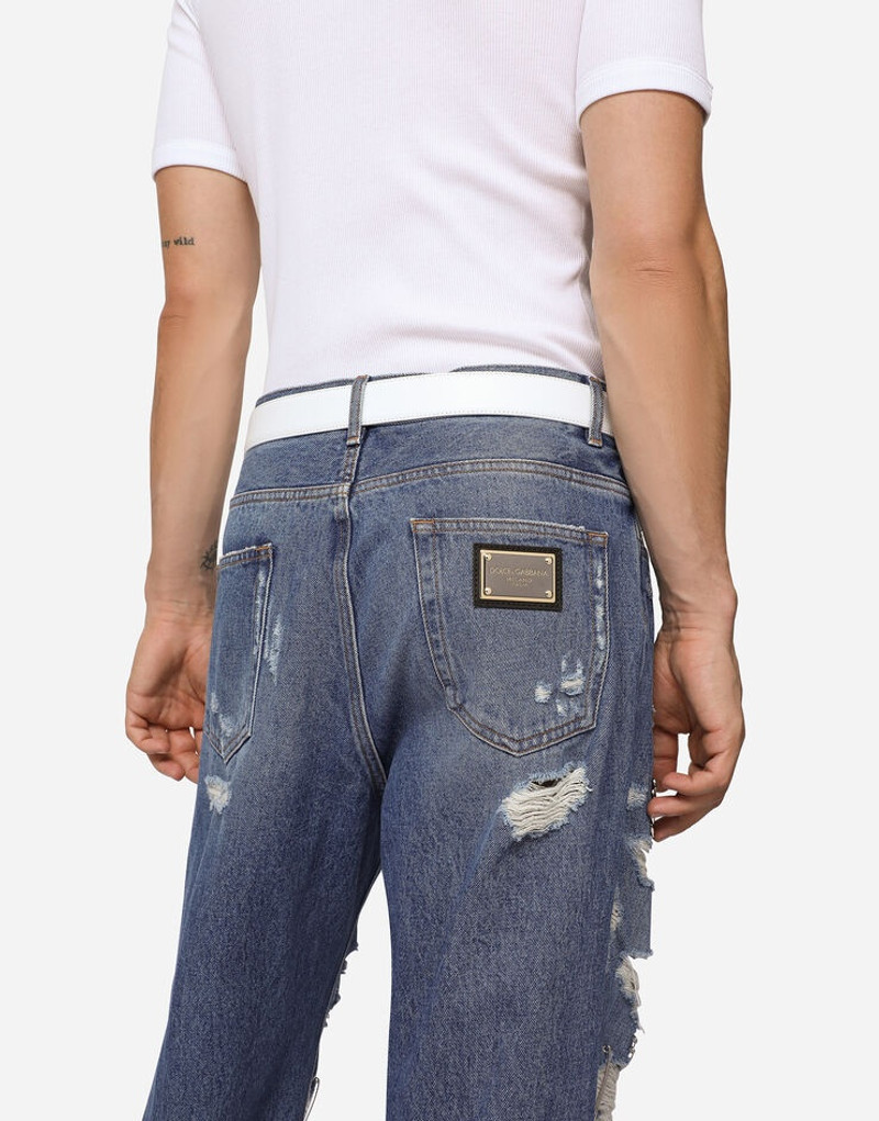 Oversize jeans with rips and safety pins 5
