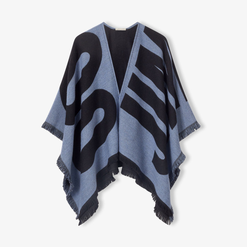 Juul
Smokey Blue Wool Woven Knitted Poncho 1