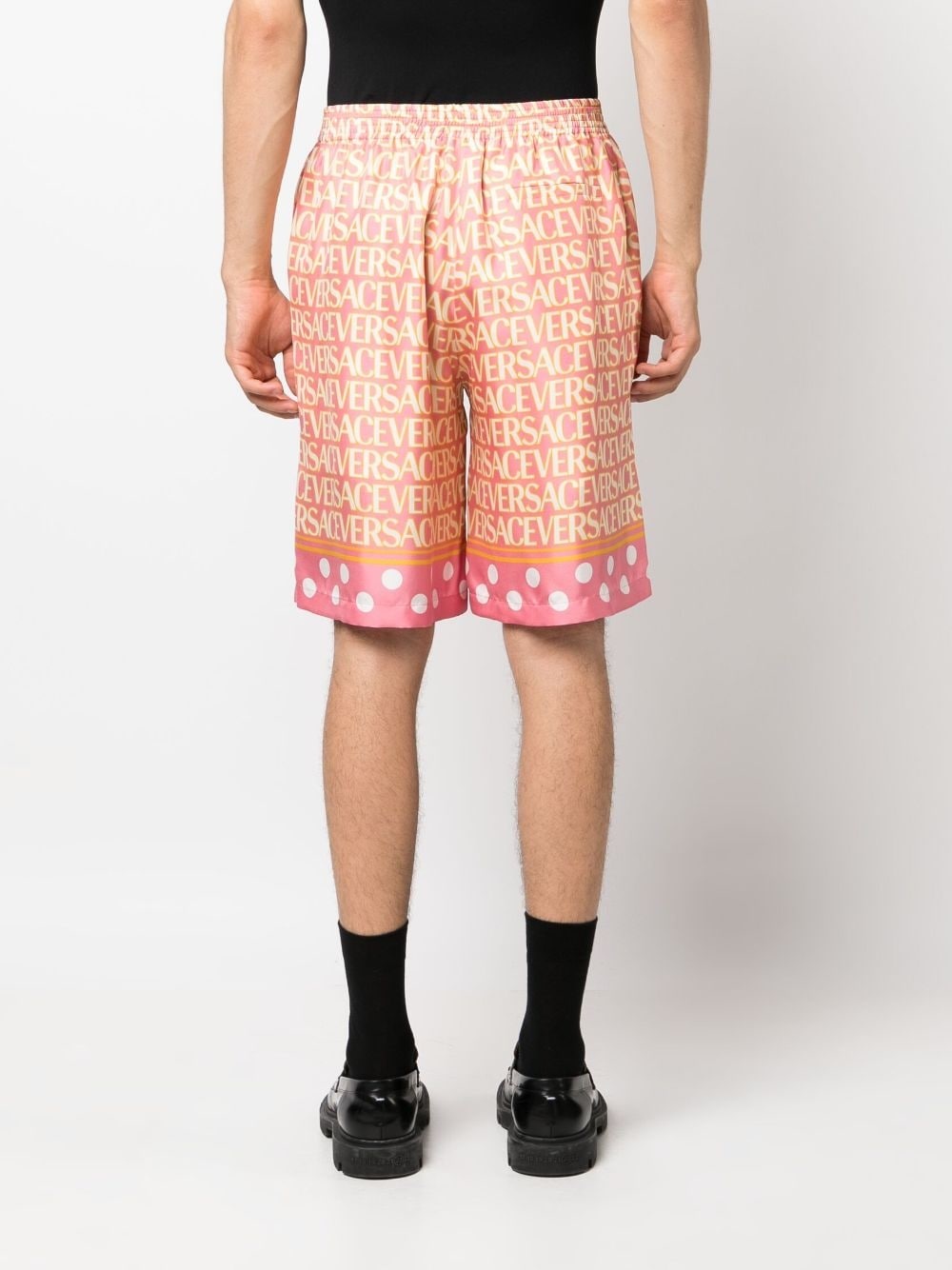 VERSACE Versace Allover logo-print silk shorts | REVERSIBLE