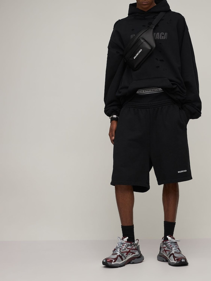 BALENCIAGA LOGO COTTON SWEAT SHORTS outlook