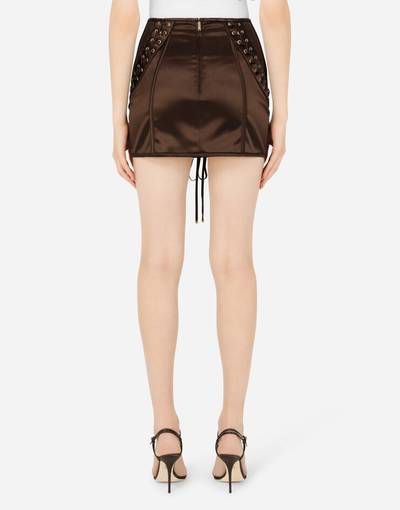 Dolce & Gabbana Satin miniskirt with laces and eyelets outlook