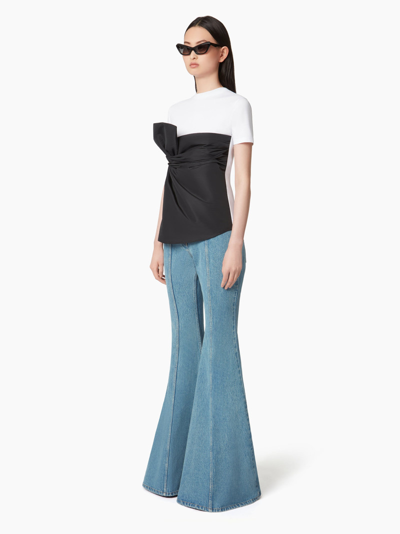 NINA RICCI DISTRESSED FLARED JEANS outlook