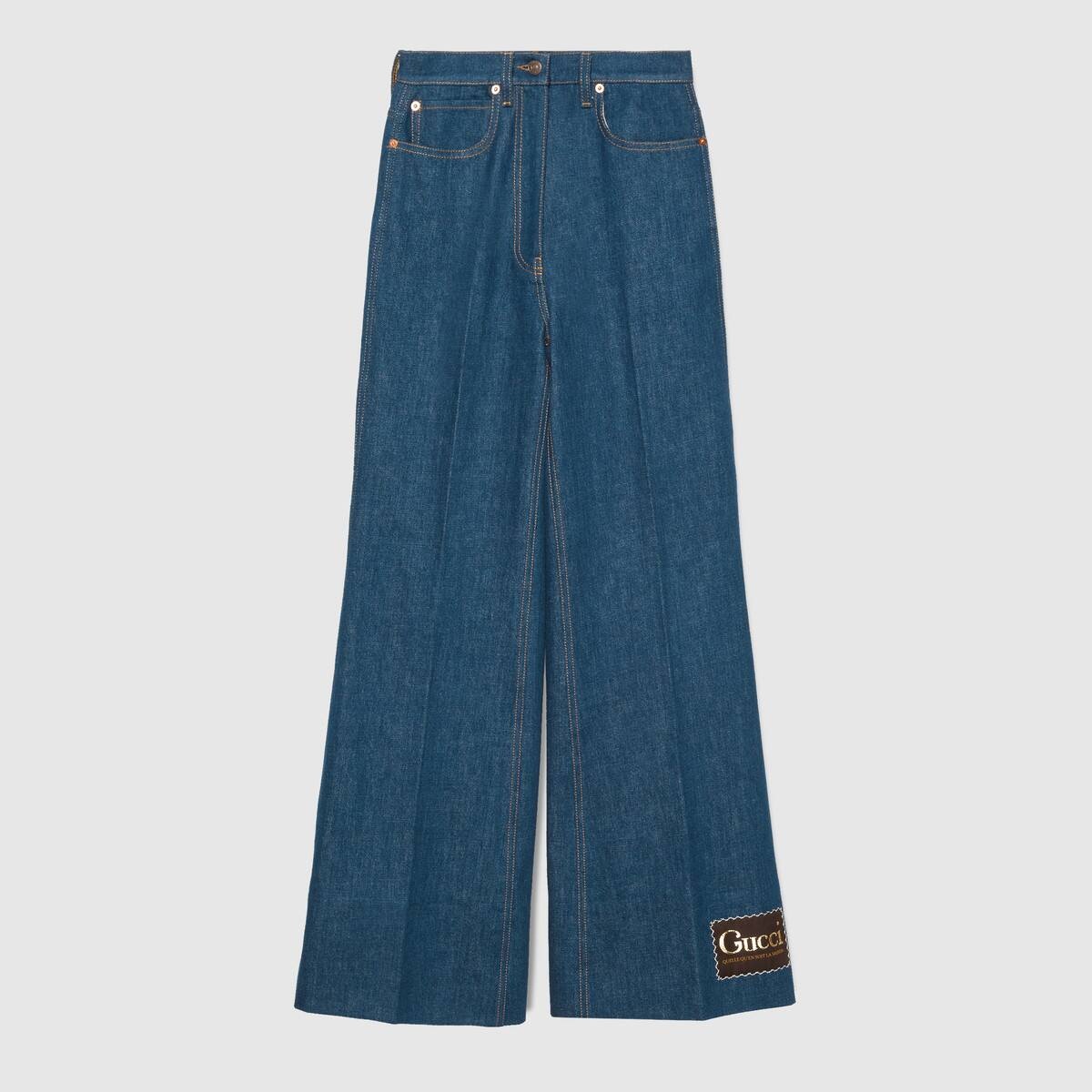 Washed denim flare pant with Gucci label - 1