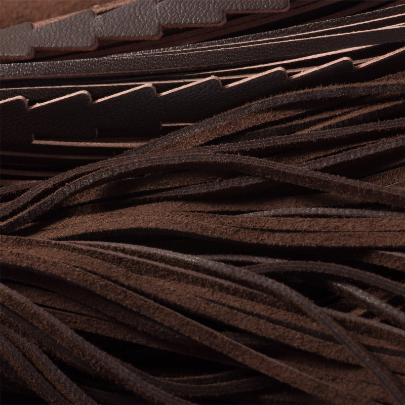 Suede handbag with tassels 5