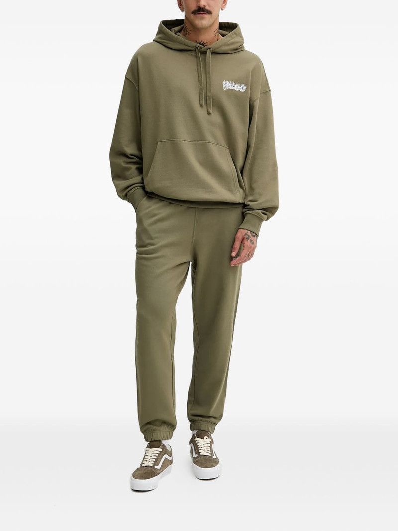 HUGO logo-print track pants outlook