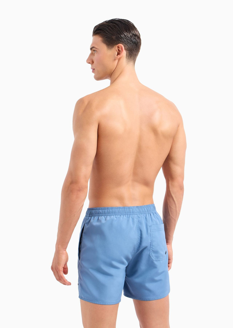 Swim trunks with laser-cut eagle patch 3