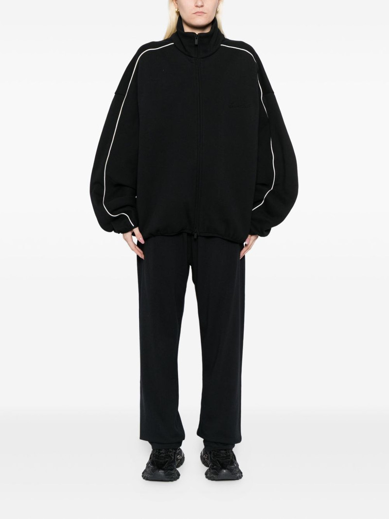 ESSENTIALS logo-patch trousers outlook