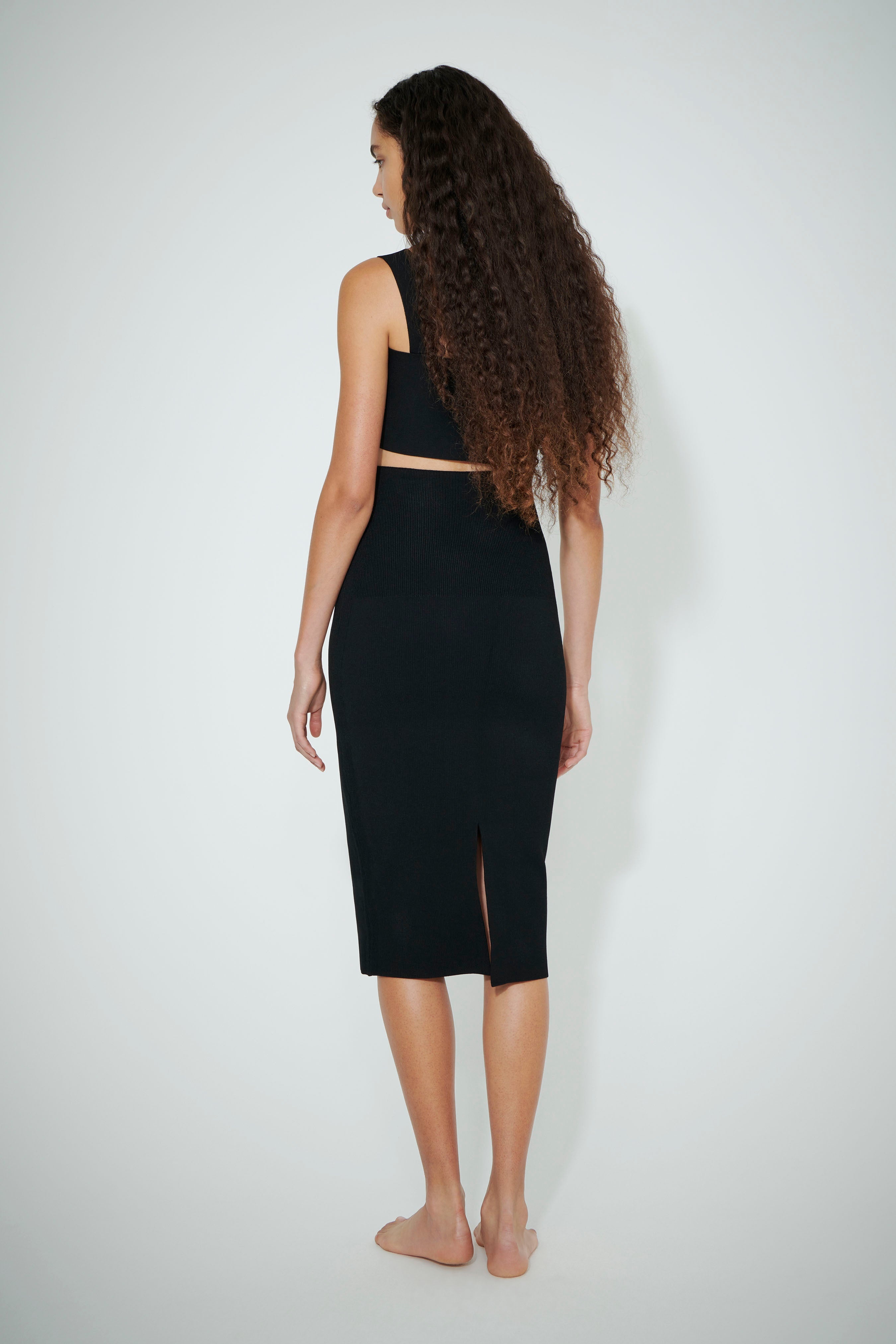 Victoria Beckham VB Body Midi Skirt in Black | REVERSIBLE
