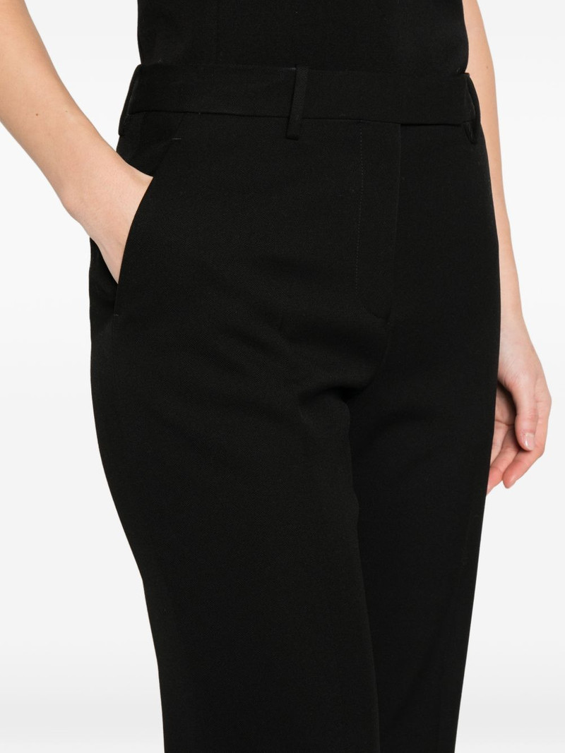 buttoned-pocket trousers 5