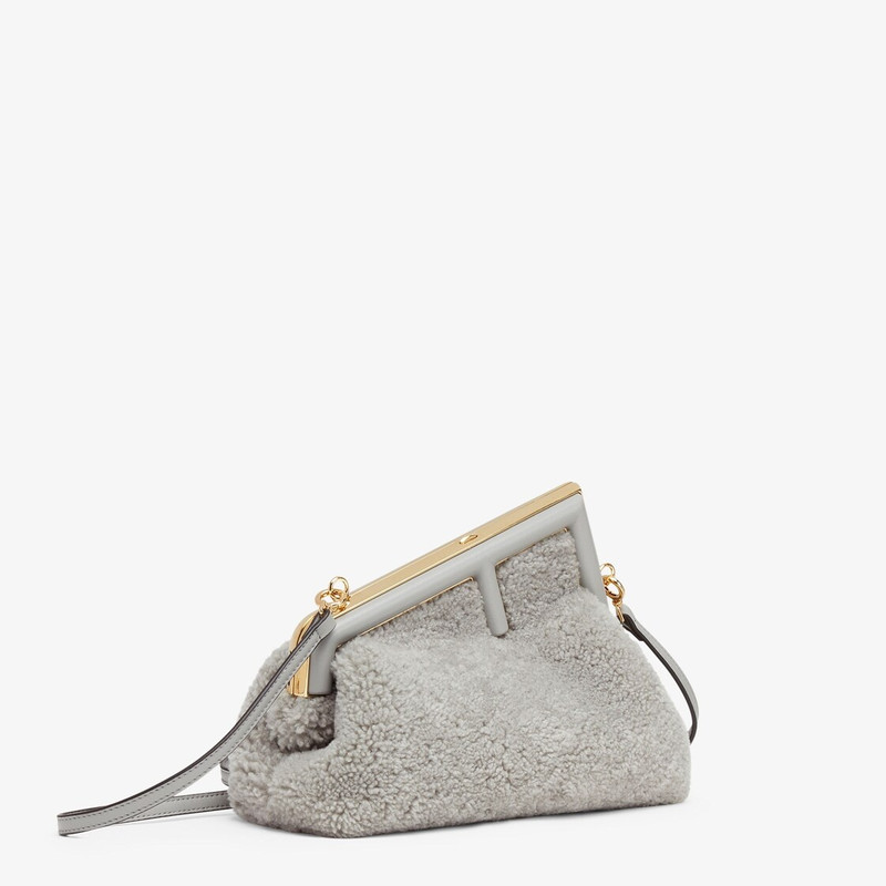 FENDI Small Fendi First bag made of soft, pale gray sheepskin with oversized metal F clasp bound in tone o outlook