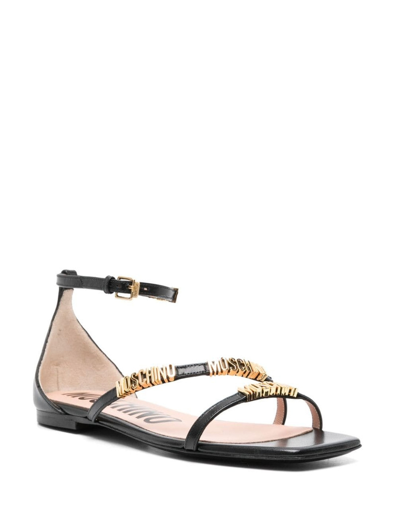 Moschino logo-lettering leather sandals outlook