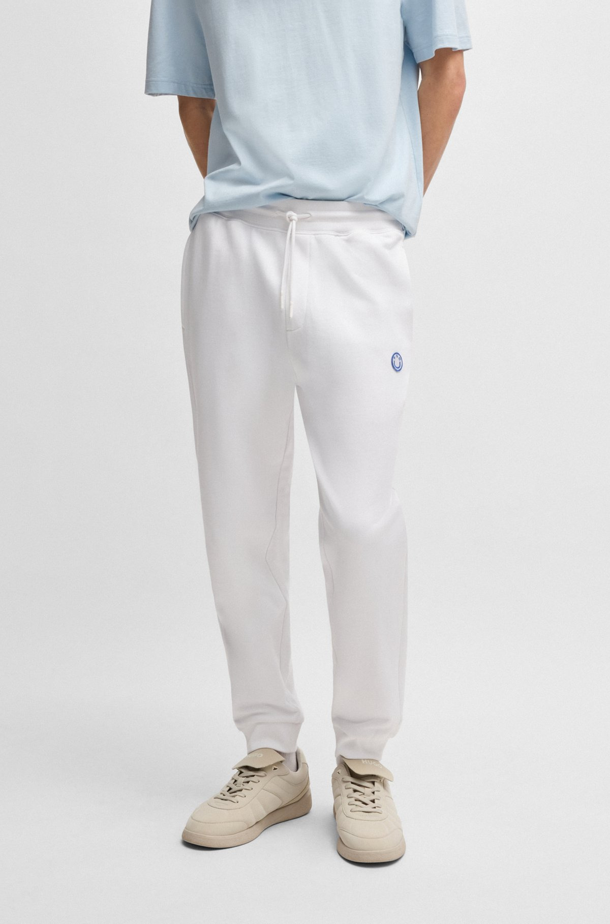 COTTON-TERRY TRACKSUIT BOTTOMS WITH HAPPY HUGO LOGO PATCH - 2