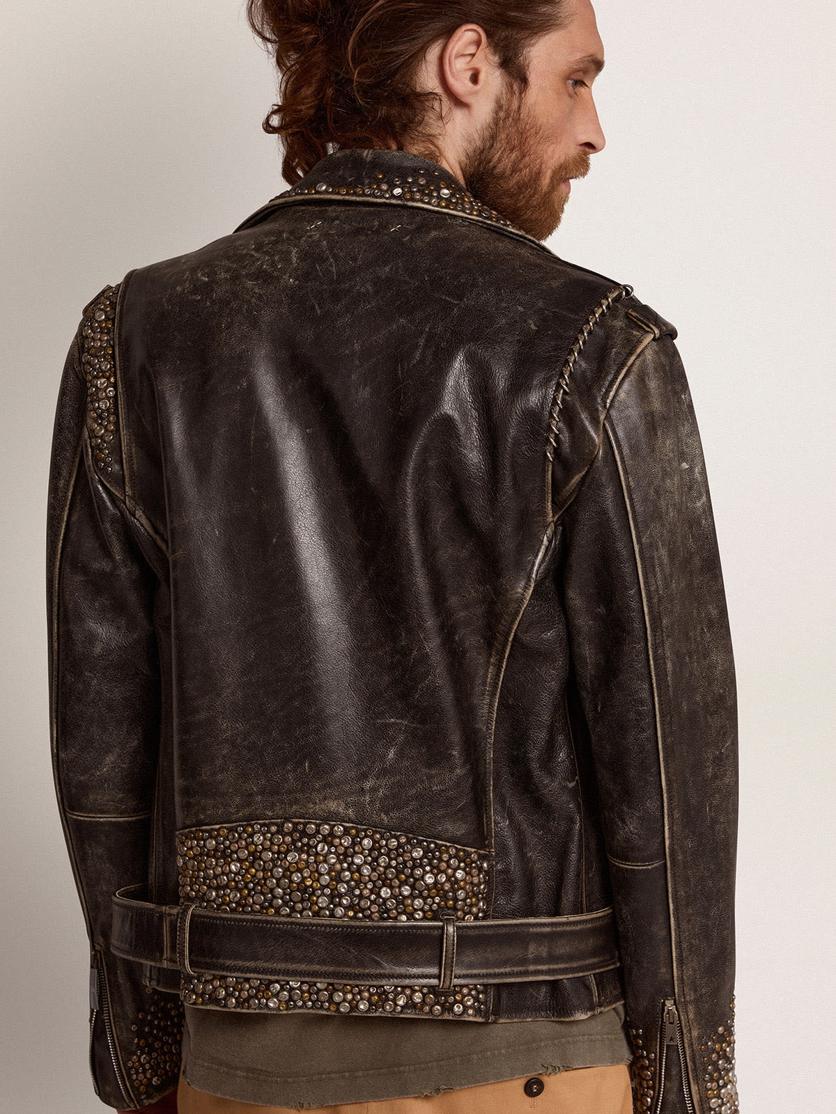Men's leather biker jacket with hammered studs and adhesive tape - 4
