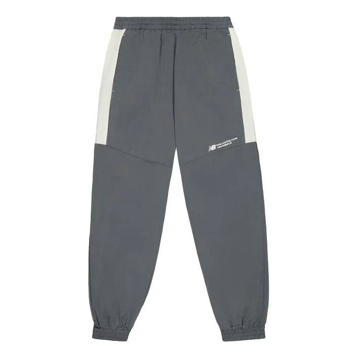 New Balance Woven Track Pants 'Dark Grey' NTE24031-DKG - 1