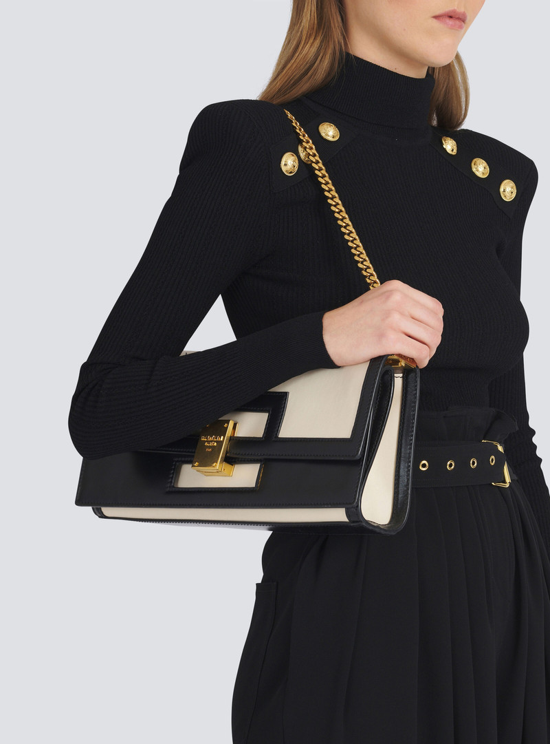Oversized black and white leather 1945 Heritage clutch bag 9